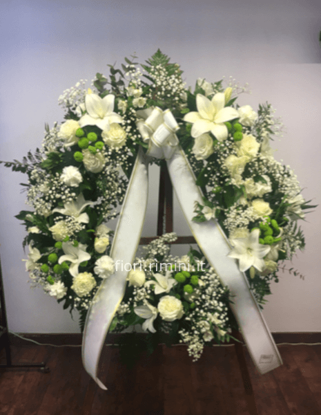 Corona funebre con fiori e colori a scelta del fiorista
